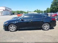 2018 Kia Optima — photo 14 of 17 | VIN 5XXGT4L36JG209407