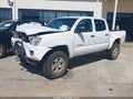 2015 Toyota Tacoma — photo 2 of 18 | VIN 5TFLU4EN3FX133297