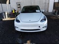 2023 Tesla Model Y — photo 13 of 19 | VIN 7SAYGDEE2PF800159