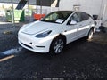 2023 Tesla Model Y — photo 2 of 19 | VIN 7SAYGDEE2PF800159