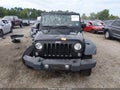 2014 Jeep Wrangler — photo 12 of 16 | VIN 1C4AJWAG3EL277926