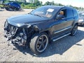 2011 Jeep Grand Cherokee — photo 2 of 16 | VIN 1J4RR6GTXBC621693