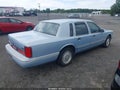 1997 Lincoln Town Car — photo 4 of 11 | VIN 1LNLM82W6VY705942