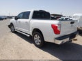 2019 Nissan Titan — photo 3 of 16 | VIN 1N6AA1EK8KN511542