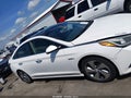 2016 Hyundai Sonata Hybrid — photo 13 of 16 | VIN KMHE34L10GA012464
