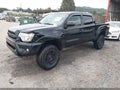 2015 Toyota Tacoma — photo 2 of 16 | VIN 3TMLU4EN5FM166839