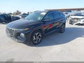 2022 Hyundai Tucson — photo 2 of 18 | VIN 5NMJE3AE0NH056061