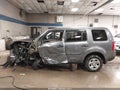 2015 Honda Pilot — photo 14 of 16 | VIN 5FNYF4H25FB022035