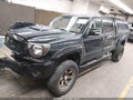 2015 Toyota Tacoma — photo 2 of 16 | VIN 3TMMU4FNXFM077433