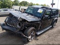 2019 Jeep Wrangler Unlimited — photo 2 of 16 | VIN 1C4HJXEN6KW590136