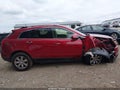 2014 Cadillac SRX — photo 13 of 16 | VIN 3GYFNBE33ES609197