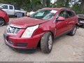 2014 Cadillac SRX — photo 2 of 16 | VIN 3GYFNBE33ES609197