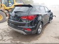 2018 Hyundai Santa Fe — photo 4 of 16 | VIN 5XYZTDLB5JG565441