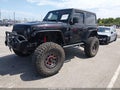 2018 Jeep Wrangler — photo 2 of 17 | VIN 1C4HJXCG7JW155760