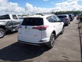 2016 Toyota RAV4 Hybrid — photo 4 of 16 | VIN JTMRJREVXGD033457