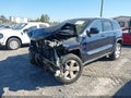 2012 Jeep Grand Cherokee — photo 2 of 16 | VIN 1C4RJFAG2CC226837