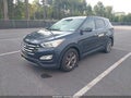 2013 Hyundai Santa Fe — photo 2 of 12 | VIN 5XYZU3LB7DG065406