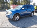 2009 Ford Escape — photo 2 of 19 | VIN 1FMCU03749KD13933