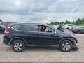 2014 Honda CR-V — photo 12 of 15 | VIN 2HKRM4H38EH606819