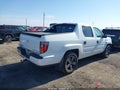 2013 Honda Ridgeline — photo 4 of 17 | VIN 5FPYK1F70DB011604
