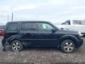 2013 Honda Pilot — photo 13 of 16 | VIN 5FNYF4H57DB026207