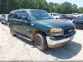2004 GMC Yukon — photo 1 of 11 | VIN 1GKEC13Z14R136432