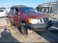 2015 Nissan Titan — photo 1 of 16 | VIN 1N6AA0EC5FN511958