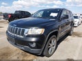 2012 Jeep Grand Cherokee — photo 2 of 16 | VIN 1C4RJFAG7CC289206