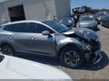 2023 Kia Sportage — photo 13 of 16 | VIN KNDPUCAF6P7198849