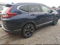 2018 Honda CR-V — photo 4 of 16 | VIN 7FARW2H95JE029327