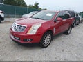 2015 Cadillac SRX — photo 2 of 15 | VIN 3GYFNCE37FS525052