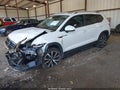 2024 Volkswagen Taos — photo 2 of 16 | VIN 3VVEX7B20RM065967