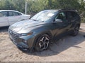 2022 Hyundai Tucson — photo 2 of 16 | VIN 5NMJECAE0NH135357