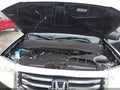 2014 Honda Pilot — photo 10 of 16 | VIN 5FNYF4H76EB003004