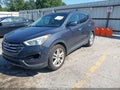 2016 Hyundai Santa Fe — photo 2 of 16 | VIN 5XYZW4LA5GG308450