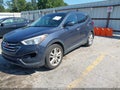 2016 Hyundai Santa Fe — photo 4 of 16 | VIN 5XYZW4LA5GG308450
