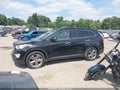 2015 Hyundai Santa Fe — photo 14 of 18 | VIN KM8SR4HF8FU099906
