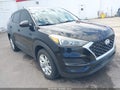 2019 Hyundai Tucson — photo 1 of 18 | VIN KM8J23A42KU995969