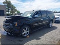 2013 Chevrolet Suburban — photo 2 of 16 | VIN 1GNSKKE74DR289509