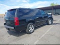 2013 Chevrolet Suburban — photo 4 of 16 | VIN 1GNSKKE74DR289509