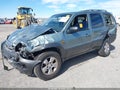 2003 Mazda Tribute — photo 2 of 10 | VIN 4F2CZ941X3KM27415