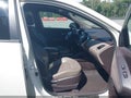 2012 Hyundai Tucson — photo 5 of 12 | VIN KM8JUCAC5CU452375