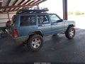 1999 Jeep Cherokee — photo 4 of 11 | VIN 1J4FT68S7XL562877