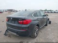 2015 BMW X4 — photo 4 of 21 | VIN 5UXXW5C58F0E88321