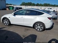 2023 Tesla Model Y — photo 15 of 20 | VIN 7SAYGAEE6PF692241