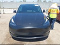 2022 Tesla Model Y — photo 11 of 15 | VIN 7SAYGDEF1NF523171
