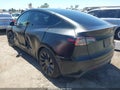 2022 Tesla Model Y — photo 3 of 15 | VIN 7SAYGDEF1NF523171