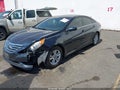 2014 Hyundai Sonata — photo 2 of 16 | VIN 5NPEB4AC0EH910550