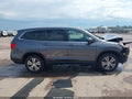 2016 Honda Pilot — photo 13 of 16 | VIN 5FNYF6H57GB125139