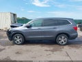 2016 Honda Pilot — photo 14 of 16 | VIN 5FNYF6H57GB125139